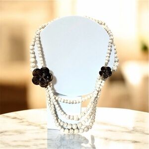 Gorgeous earth tone beaded necklace with brown floral accents